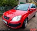 Красный Киа Рио, объемом двигателя 1.4 л и пробегом 218 тыс. км за 4200 $, фото 1 на Automoto.ua