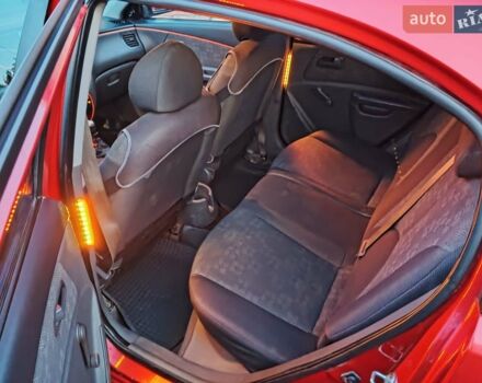 Красный Киа Рио, объемом двигателя 1.4 л и пробегом 275 тыс. км за 4000 $, фото 6 на Automoto.ua