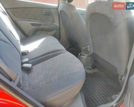 Червоний Кіа Ріо, об'ємом двигуна 1.4 л та пробігом 161 тис. км за 4200 $, фото 4 на Automoto.ua