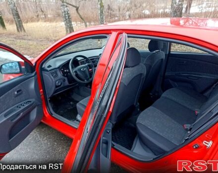 Червоний Кіа Ріо, об'ємом двигуна 1.4 л та пробігом 20200 тис. км за 3999 $, фото 6 на Automoto.ua