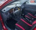 Червоний Кіа Ріо, об'ємом двигуна 1.4 л та пробігом 213 тис. км за 3450 $, фото 11 на Automoto.ua