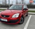 Червоний Кіа Ріо, об'ємом двигуна 1.4 л та пробігом 214 тис. км за 4500 $, фото 1 на Automoto.ua