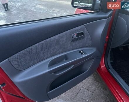Червоний Кіа Ріо, об'ємом двигуна 1.4 л та пробігом 213 тис. км за 3450 $, фото 10 на Automoto.ua