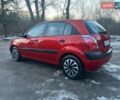 Червоний Кіа Ріо, об'ємом двигуна 1.4 л та пробігом 213 тис. км за 3450 $, фото 1 на Automoto.ua