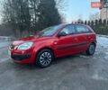 Червоний Кіа Ріо, об'ємом двигуна 1.4 л та пробігом 213 тис. км за 3450 $, фото 1 на Automoto.ua