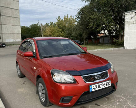Червоний Кіа Ріо, об'ємом двигуна 1.4 л та пробігом 114 тис. км за 5500 $, фото 9 на Automoto.ua