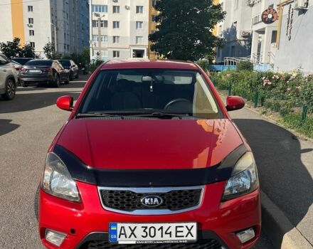 Красный Киа Рио, объемом двигателя 1.4 л и пробегом 144 тыс. км за 7200 $, фото 1 на Automoto.ua
