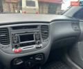 Красный Киа Рио, объемом двигателя 1.4 л и пробегом 119 тыс. км за 5777 $, фото 11 на Automoto.ua