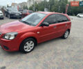 Красный Киа Рио, объемом двигателя 1.4 л и пробегом 119 тыс. км за 5777 $, фото 1 на Automoto.ua