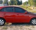 Красный Киа Рио, объемом двигателя 1.4 л и пробегом 213 тыс. км за 6000 $, фото 4 на Automoto.ua