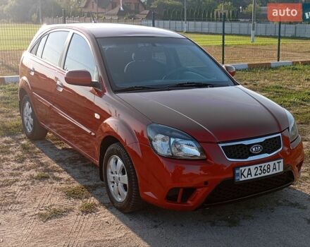 Красный Киа Рио, объемом двигателя 1.4 л и пробегом 213 тыс. км за 6000 $, фото 1 на Automoto.ua