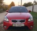 Красный Киа Рио, объемом двигателя 1.4 л и пробегом 95 тыс. км за 8000 $, фото 1 на Automoto.ua