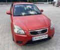 Червоний Кіа Ріо, об'ємом двигуна 1.4 л та пробігом 267 тис. км за 3500 $, фото 1 на Automoto.ua