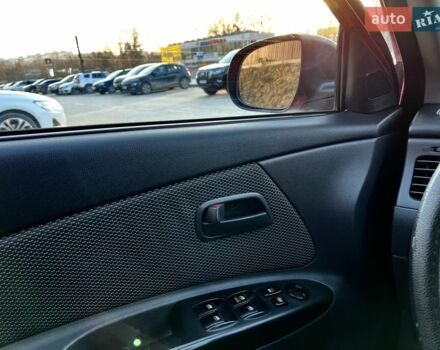 Червоний Кіа Ріо, об'ємом двигуна 1.4 л та пробігом 171 тис. км за 5700 $, фото 12 на Automoto.ua