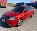 Червоний Кіа Ріо, об'ємом двигуна 1.4 л та пробігом 211 тис. км за 6200 $, фото 1 на Automoto.ua