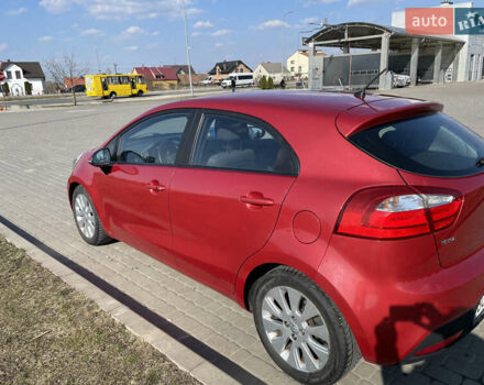 Красный Киа Рио, объемом двигателя 1.4 л и пробегом 208 тыс. км за 6500 $, фото 1 на Automoto.ua