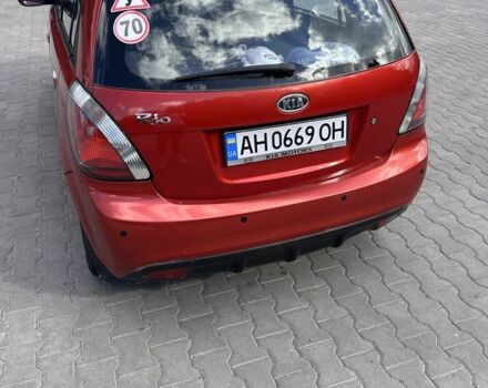 Червоний Кіа Ріо, об'ємом двигуна 1.4 л та пробігом 267 тис. км за 3500 $, фото 1 на Automoto.ua