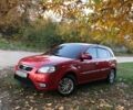 Красный Киа Рио, объемом двигателя 1.4 л и пробегом 95 тыс. км за 8000 $, фото 1 на Automoto.ua