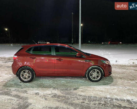 Червоний Кіа Ріо, об'ємом двигуна 1.4 л та пробігом 163 тис. км за 5600 $, фото 10 на Automoto.ua