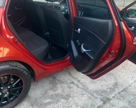 Красный Киа Рио, объемом двигателя 1.4 л и пробегом 123 тыс. км за 8308 $, фото 4 на Automoto.ua