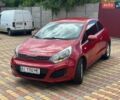 Червоний Кіа Ріо, об'ємом двигуна 1.12 л та пробігом 240 тис. км за 5000 $, фото 1 на Automoto.ua