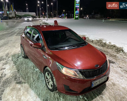 Червоний Кіа Ріо, об'ємом двигуна 1.4 л та пробігом 163 тис. км за 5600 $, фото 1 на Automoto.ua
