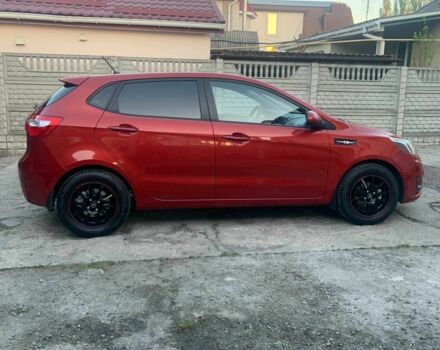 Красный Киа Рио, объемом двигателя 1.4 л и пробегом 123 тыс. км за 8308 $, фото 2 на Automoto.ua