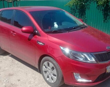 Червоний Кіа Ріо, об'ємом двигуна 1.6 л та пробігом 28 тис. км за 8159 $, фото 2 на Automoto.ua