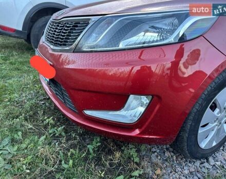 Красный Киа Рио, объемом двигателя 1.59 л и пробегом 103 тыс. км за 7129 $, фото 4 на Automoto.ua