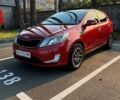 Червоний Кіа Ріо, об'ємом двигуна 1.6 л та пробігом 236 тис. км за 9000 $, фото 1 на Automoto.ua