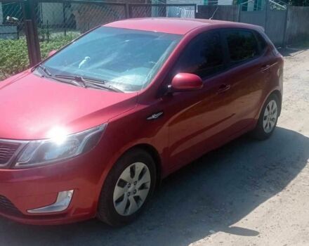 Червоний Кіа Ріо, об'ємом двигуна 1.6 л та пробігом 28 тис. км за 8159 $, фото 1 на Automoto.ua