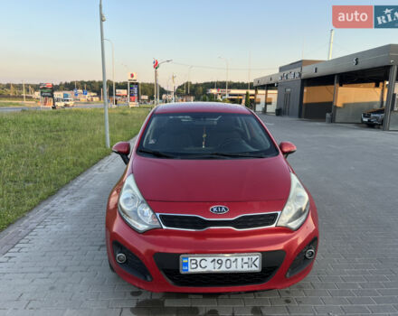 Красный Киа Рио, объемом двигателя 1.1 л и пробегом 203 тыс. км за 6000 $, фото 1 на Automoto.ua
