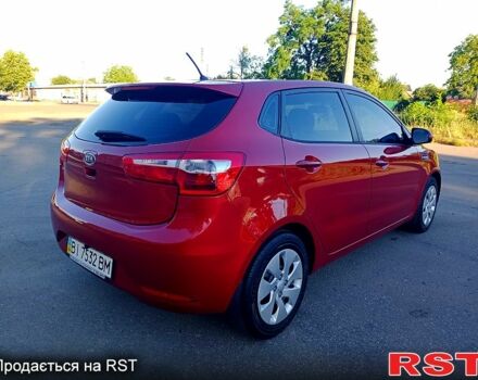 Червоний Кіа Ріо, об'ємом двигуна 1.6 л та пробігом 28 тис. км за 10650 $, фото 3 на Automoto.ua