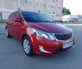 Червоний Кіа Ріо, об'ємом двигуна 1.6 л та пробігом 28 тис. км за 10350 $, фото 5 на Automoto.ua
