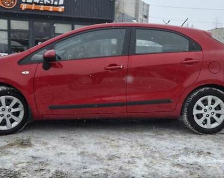 Красный Киа Рио, объемом двигателя 1.12 л и пробегом 97 тыс. км за 6700 $, фото 1 на Automoto.ua