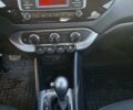Червоний Кіа Ріо, об'ємом двигуна 1.4 л та пробігом 104 тис. км за 9500 $, фото 12 на Automoto.ua