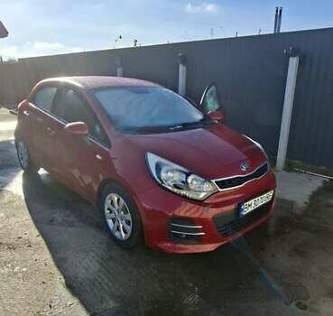 Червоний Кіа Ріо, об'ємом двигуна 1.4 л та пробігом 104 тис. км за 9500 $, фото 1 на Automoto.ua