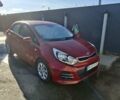Червоний Кіа Ріо, об'ємом двигуна 1.4 л та пробігом 104 тис. км за 9500 $, фото 1 на Automoto.ua