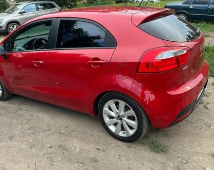 Червоний Кіа Ріо, об'ємом двигуна 1.4 л та пробігом 185 тис. км за 10000 $, фото 3 на Automoto.ua