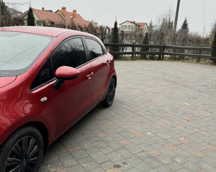 Красный Киа Рио, объемом двигателя 1.4 л и пробегом 100 тыс. км за 7700 $, фото 2 на Automoto.ua