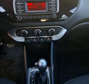 Червоний Кіа Ріо, об'ємом двигуна 1.4 л та пробігом 104 тис. км за 9500 $, фото 11 на Automoto.ua