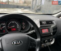 Червоний Кіа Ріо, об'ємом двигуна 1.4 л та пробігом 77 тис. км за 9900 $, фото 10 на Automoto.ua