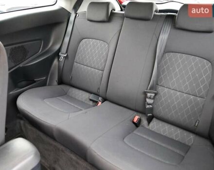 Красный Киа Рио, объемом двигателя 1.4 л и пробегом 77 тыс. км за 12000 $, фото 7 на Automoto.ua