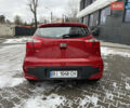 Червоний Кіа Ріо, об'ємом двигуна 1.4 л та пробігом 77 тис. км за 9900 $, фото 4 на Automoto.ua