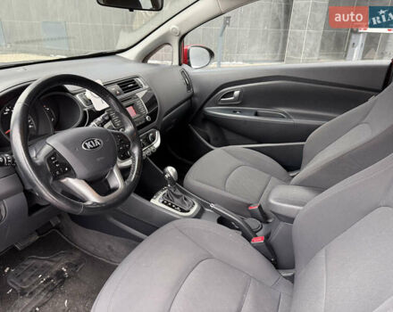 Червоний Кіа Ріо, об'ємом двигуна 1.4 л та пробігом 77 тис. км за 9900 $, фото 12 на Automoto.ua