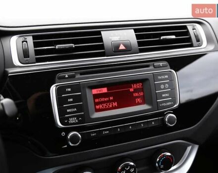 Красный Киа Рио, объемом двигателя 1.4 л и пробегом 77 тыс. км за 12000 $, фото 13 на Automoto.ua