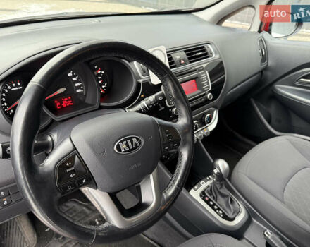 Червоний Кіа Ріо, об'ємом двигуна 1.4 л та пробігом 77 тис. км за 9900 $, фото 13 на Automoto.ua