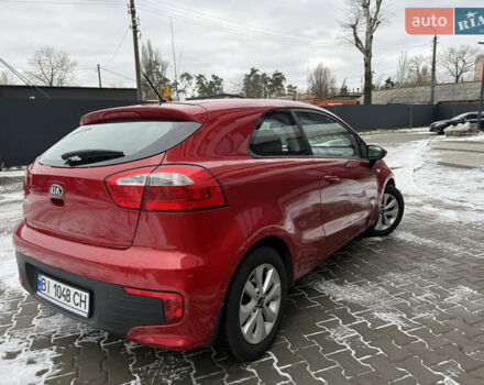 Червоний Кіа Ріо, об'ємом двигуна 1.4 л та пробігом 77 тис. км за 9900 $, фото 3 на Automoto.ua