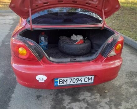 Червоний Кіа Ріо, об'ємом двигуна 1.3 л та пробігом 323 тис. км за 2200 $, фото 7 на Automoto.ua