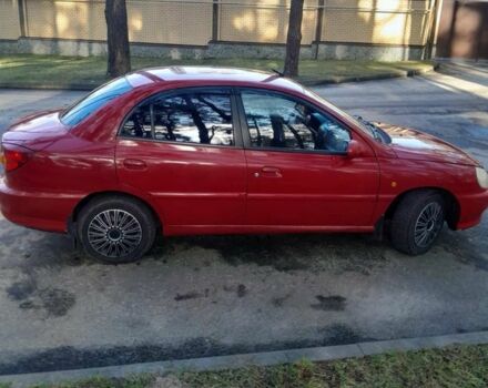 Червоний Кіа Ріо, об'ємом двигуна 1.3 л та пробігом 323 тис. км за 2200 $, фото 1 на Automoto.ua